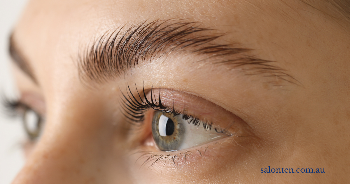 Close-up of a tinted brow and lifted, tinted lashes